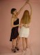 Couple of sexy girls in sexy dresses decide to dance
